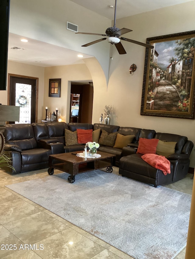 6540 E Wildcat Dr, Cave Creek, AZ 85331 - living room with arched walkways, a ceiling fan, and recessed lighting