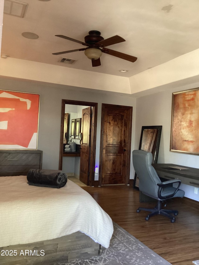 6540 E Wildcat Dr, Cave Creek, AZ 85331 - bedroom with wood finished floors and a ceiling fan