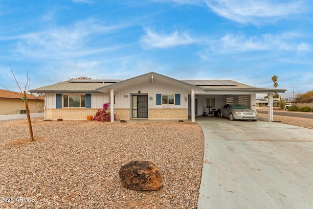 ranch-style home with a carport