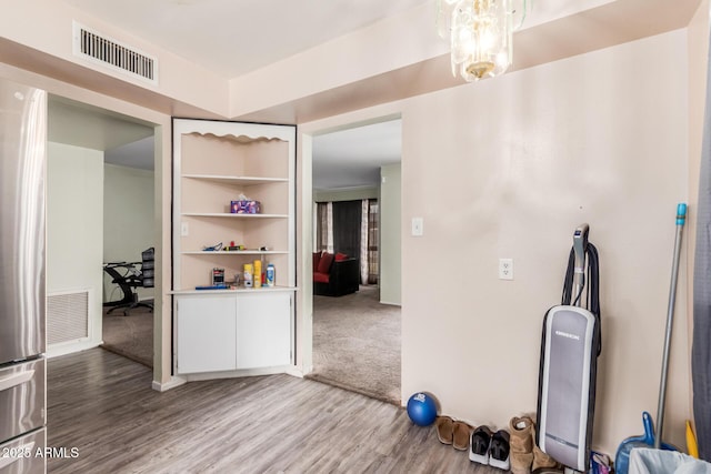 hall featuring wood-type flooring