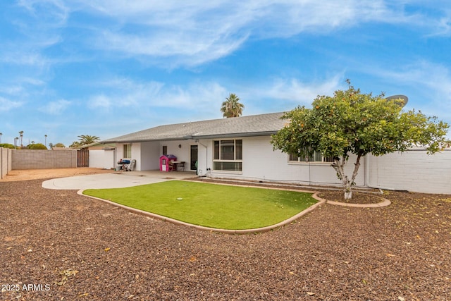 rear view of property with a patio area