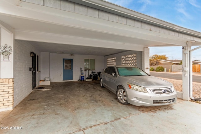 garage featuring a carport