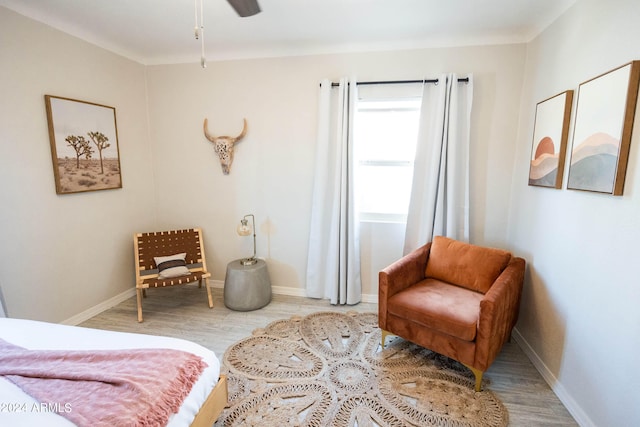 bedroom with wood-type flooring and ceiling fan