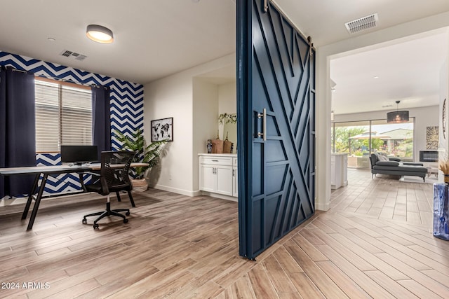 office space featuring light wood-type flooring