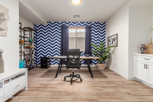 office with light hardwood / wood-style floors