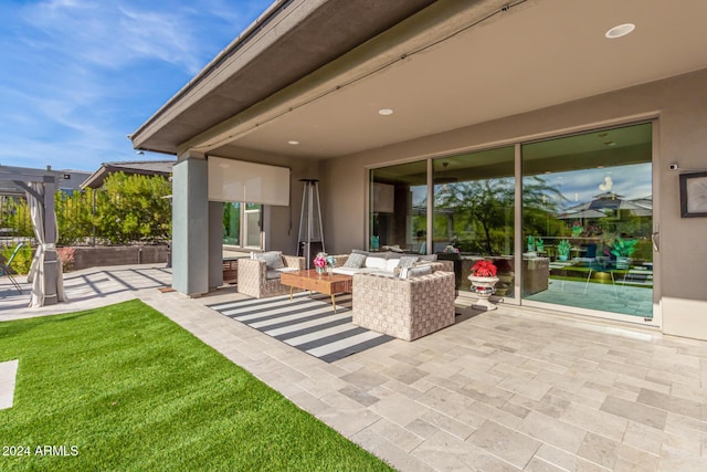 view of patio / terrace featuring outdoor lounge area and a pergola