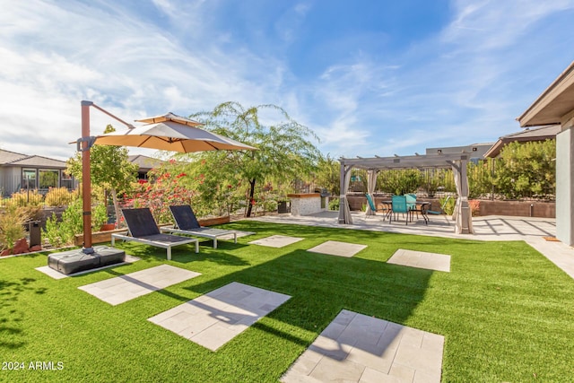 view of yard featuring a pergola and a patio area