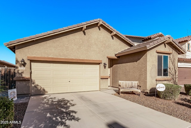 view of front of property with a garage