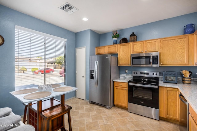 kitchen with appliances with stainless steel finishes