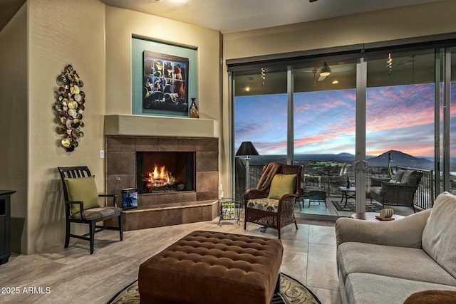 living room featuring a fireplace