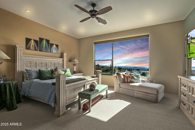 bedroom with ceiling fan and carpet