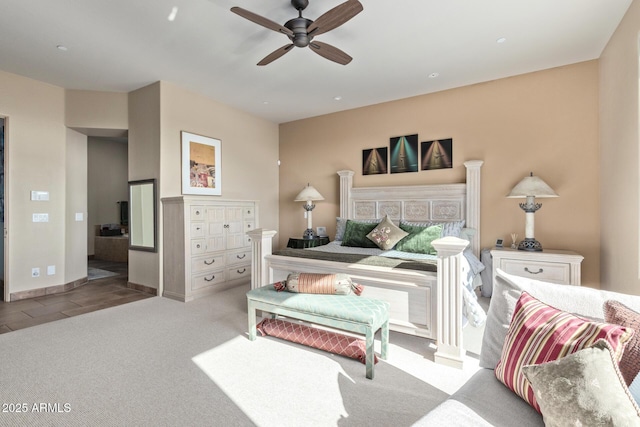 carpeted bedroom with ceiling fan