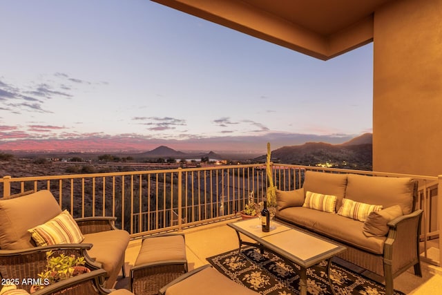 balcony at dusk with an outdoor hangout area