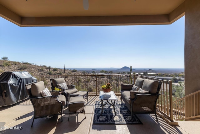 view of patio / terrace with a balcony, an outdoor hangout area, and grilling area