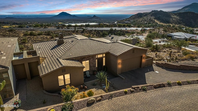 aerial view at dusk with a mountain view