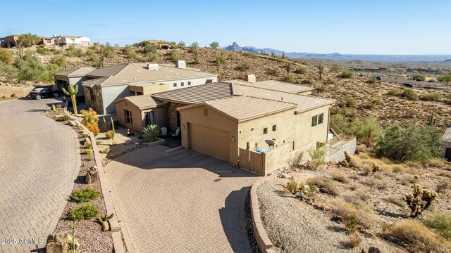 birds eye view of property with a mountain view