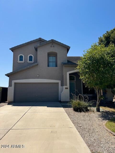 view of front of house with a garage