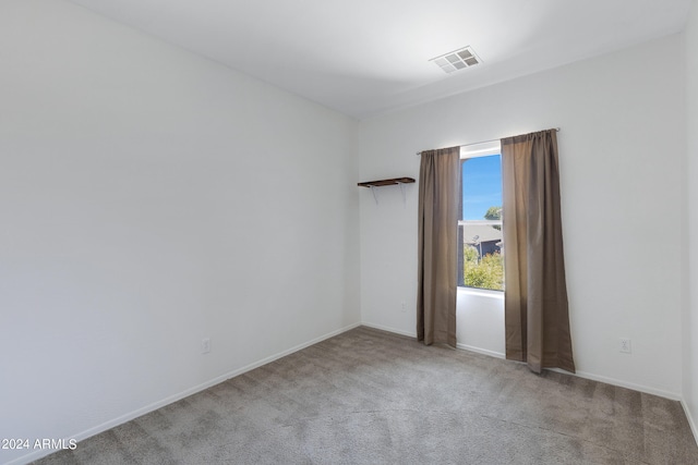 view of carpeted spare room