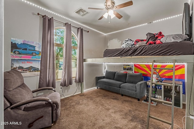 bedroom with visible vents and carpet flooring