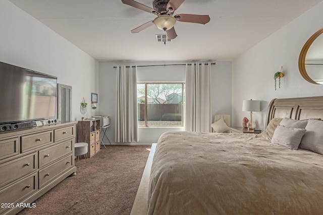 bedroom featuring visible vents, a ceiling fan, and carpet floors