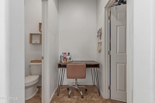 tiled home office featuring baseboards