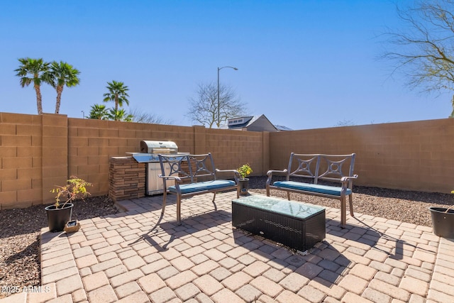 view of patio / terrace with a fenced backyard