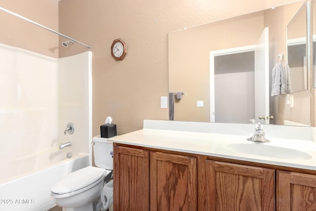 bathroom with toilet, washtub / shower combination, and vanity