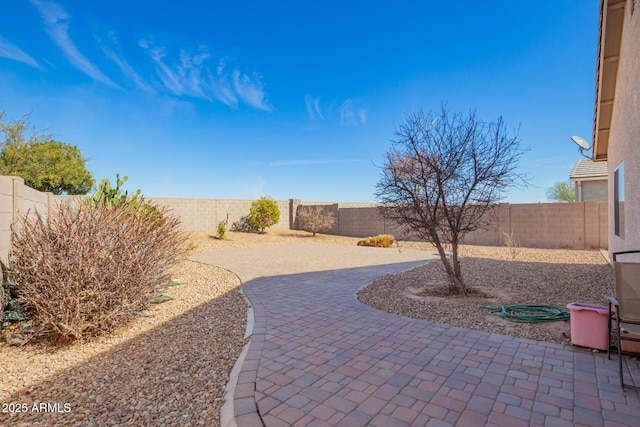 view of patio featuring a fenced backyard