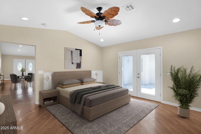 4112 N 4th Ave, Phoenix, AZ 85013 - bedroom with access to exterior, french doors, lofted ceiling, wood finished floors, and baseboards