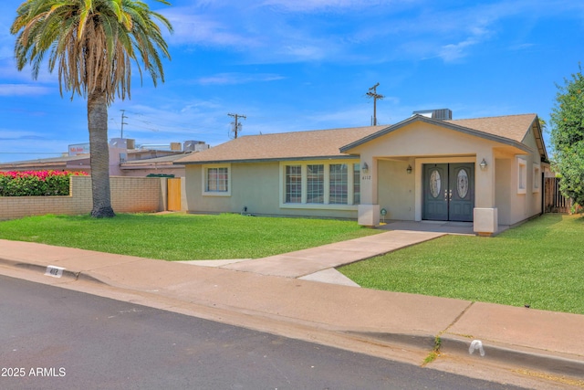 4112 N 4th Ave, Phoenix, AZ 85013 - ranch-style home with stucco siding and a shingled roof