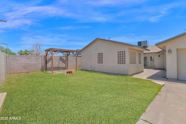 4112 N 4th Ave, Phoenix, AZ 85013 - view of yard with central AC and a pergola