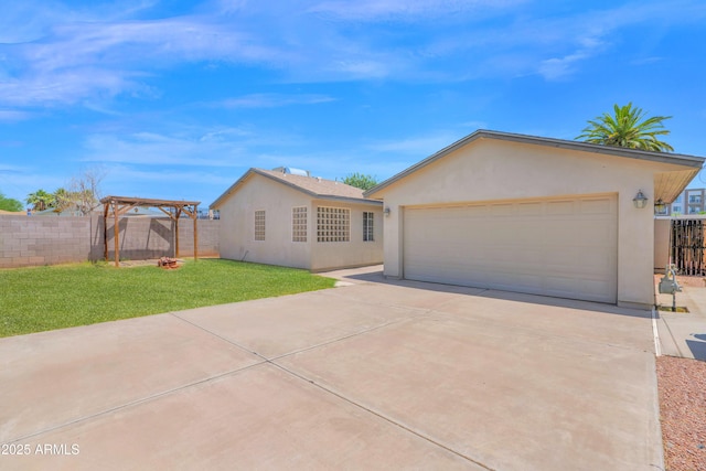 4112 N 4th Ave, Phoenix, AZ 85013 - ranch-style home with stucco siding, a garage, driveway, and a pergola