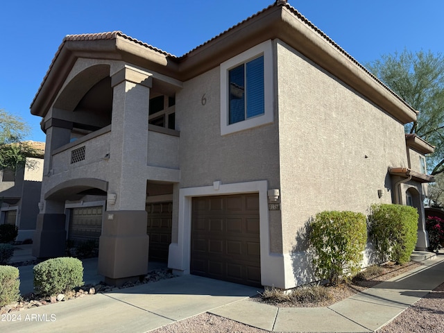 exterior space featuring a garage