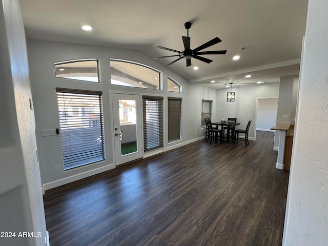 entryway featuring lofted ceiling, dark hardwood / wood-style floors, and ceiling fan