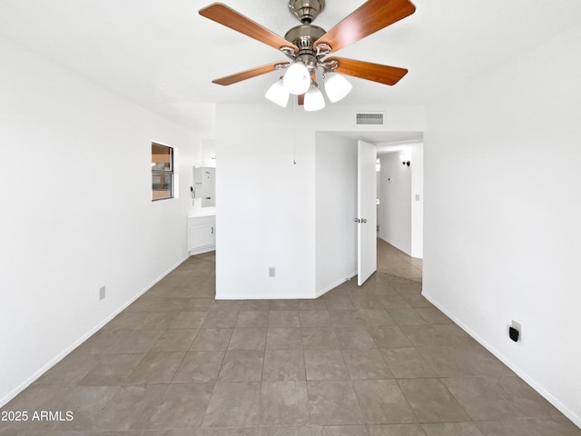 12342 S Shoshoni Dr, Phoenix, AZ 85044 - empty room with a ceiling fan and baseboards