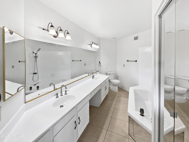 12342 S Shoshoni Dr, Phoenix, AZ 85044 - bathroom featuring toilet, double vanity, a shower, tile patterned flooring, and a tub