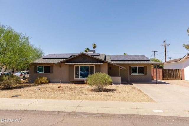 8532 E Sheridan St, Scottsdale, AZ 85257 - ranch-style home with solar panels and driveway