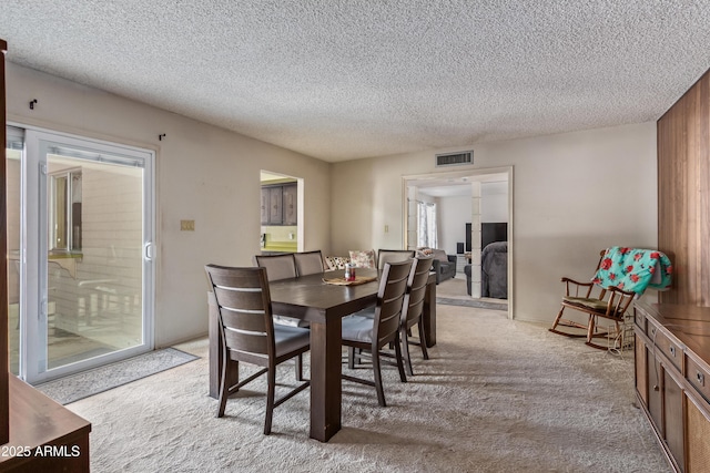 8540 N 43rd Dr, Glendale, AZ 85302 - dining room with light carpet and a textured ceiling
