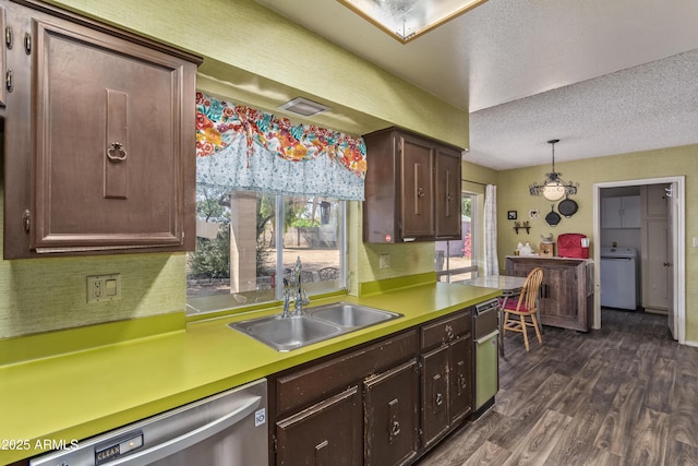 8540 N 43rd Dr, Glendale, AZ 85302 - kitchen featuring a sink, washer / dryer, dark wood-style floors, dishwasher, and a textured ceiling