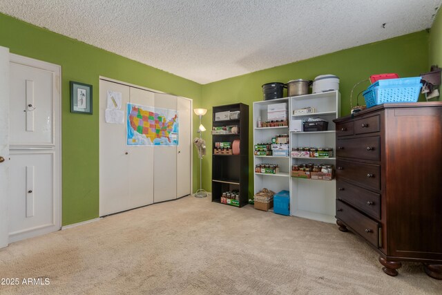8540 N 43rd Dr, Glendale, AZ 85302 - recreation room featuring light colored carpet and a textured ceiling