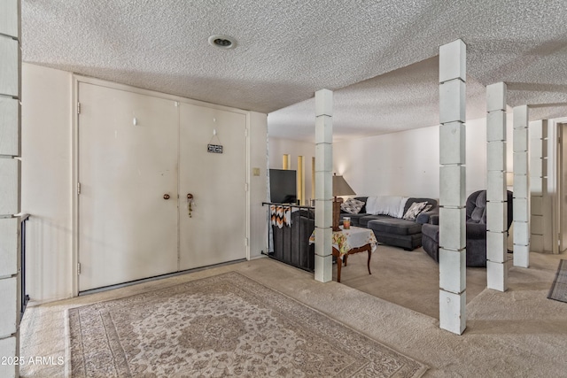 8540 N 43rd Dr, Glendale, AZ 85302 - entrance foyer featuring light colored carpet and a textured ceiling