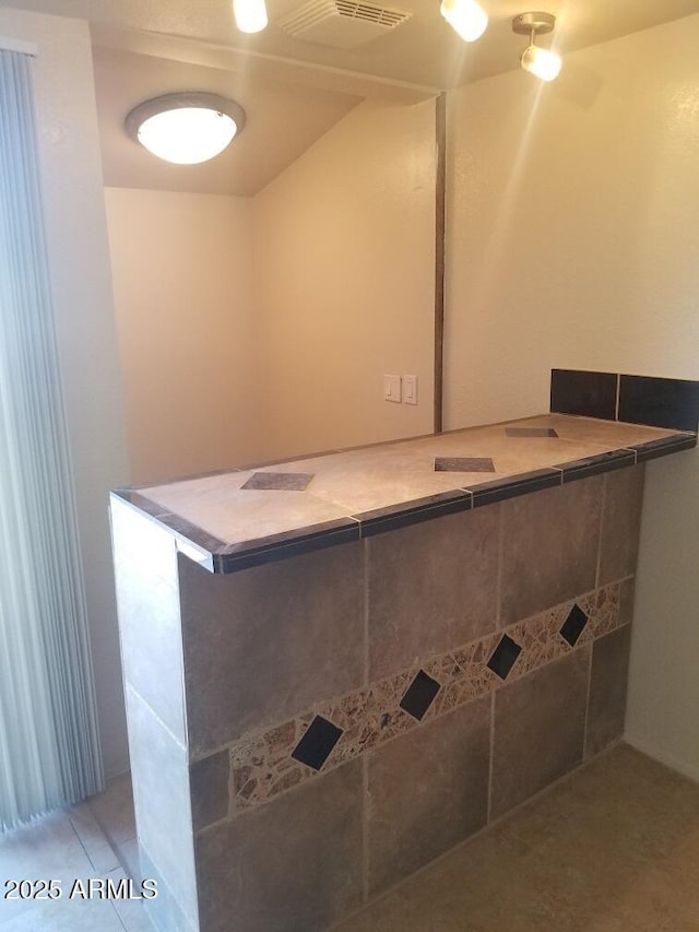 bathroom with visible vents and tile patterned floors