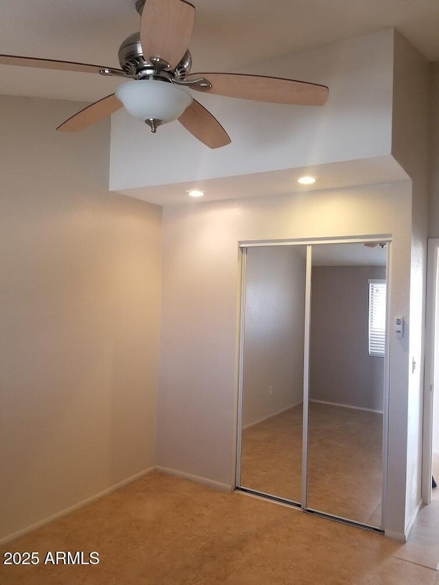unfurnished bedroom featuring recessed lighting, light colored carpet, and a closet