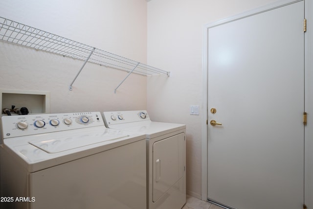 washroom with washer and clothes dryer