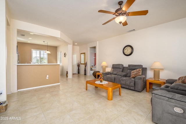 living room with ceiling fan