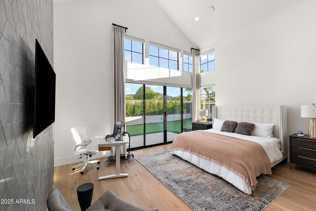 1013 W Ardmore Rd, Phoenix, AZ 85041 - bedroom with access to exterior, high vaulted ceiling, light wood-style floors, a desk, and recessed lighting