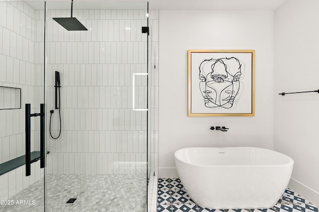 1013 W Ardmore Rd, Phoenix, AZ 85041 - full bathroom featuring a tile shower, a soaking tub, and baseboards