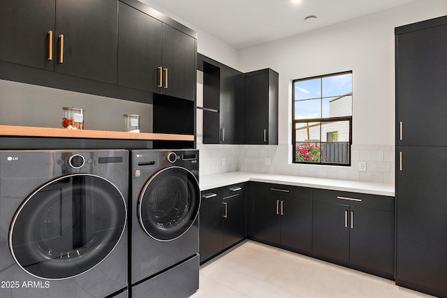 1013 W Ardmore Rd, Phoenix, AZ 85041 - laundry room featuring washing machine and dryer and cabinet space