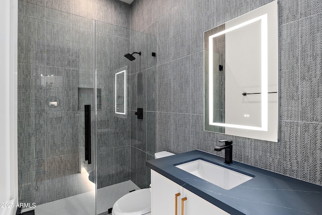 1013 W Ardmore Rd, Phoenix, AZ 85041 - full bath featuring tile walls, tiled shower, vanity, and toilet