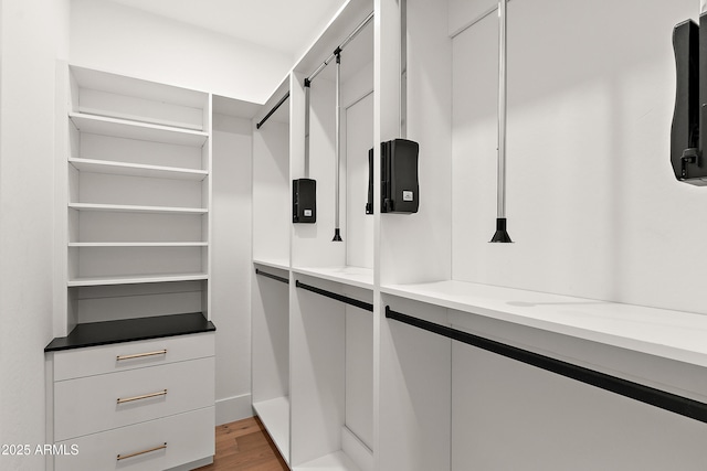 1013 W Ardmore Rd, Phoenix, AZ 85041 - walk in closet featuring light wood-style floors